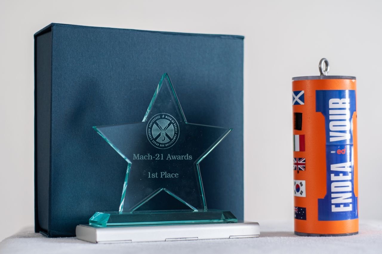 Mach-21 first place trophy beside an Endeavour rocket airframe